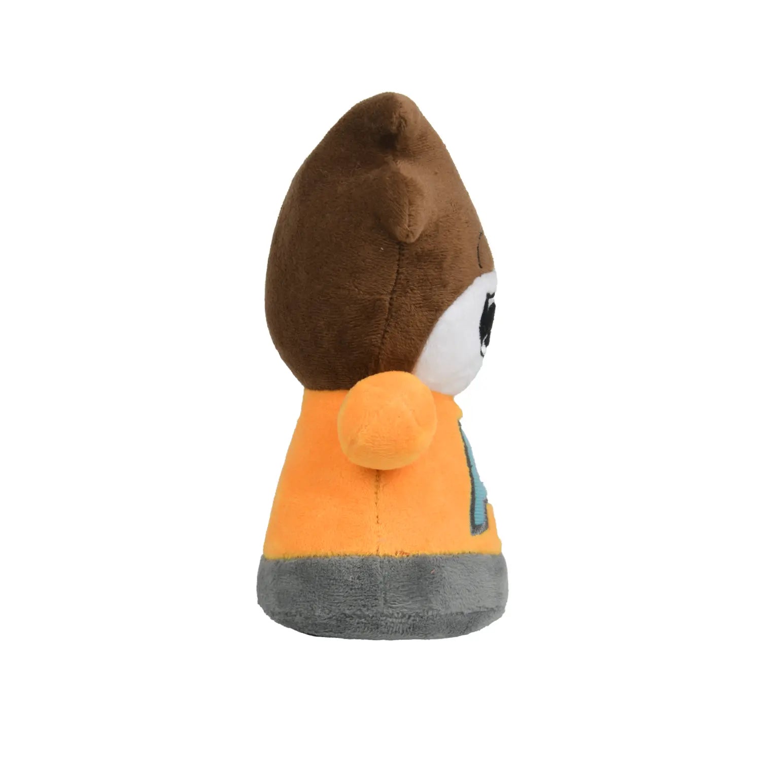 A plush toy character with brown hair, a white face, a black mouth, and an orange shirt featuring a light blue letter 'A' on the front, set against a plain white background.